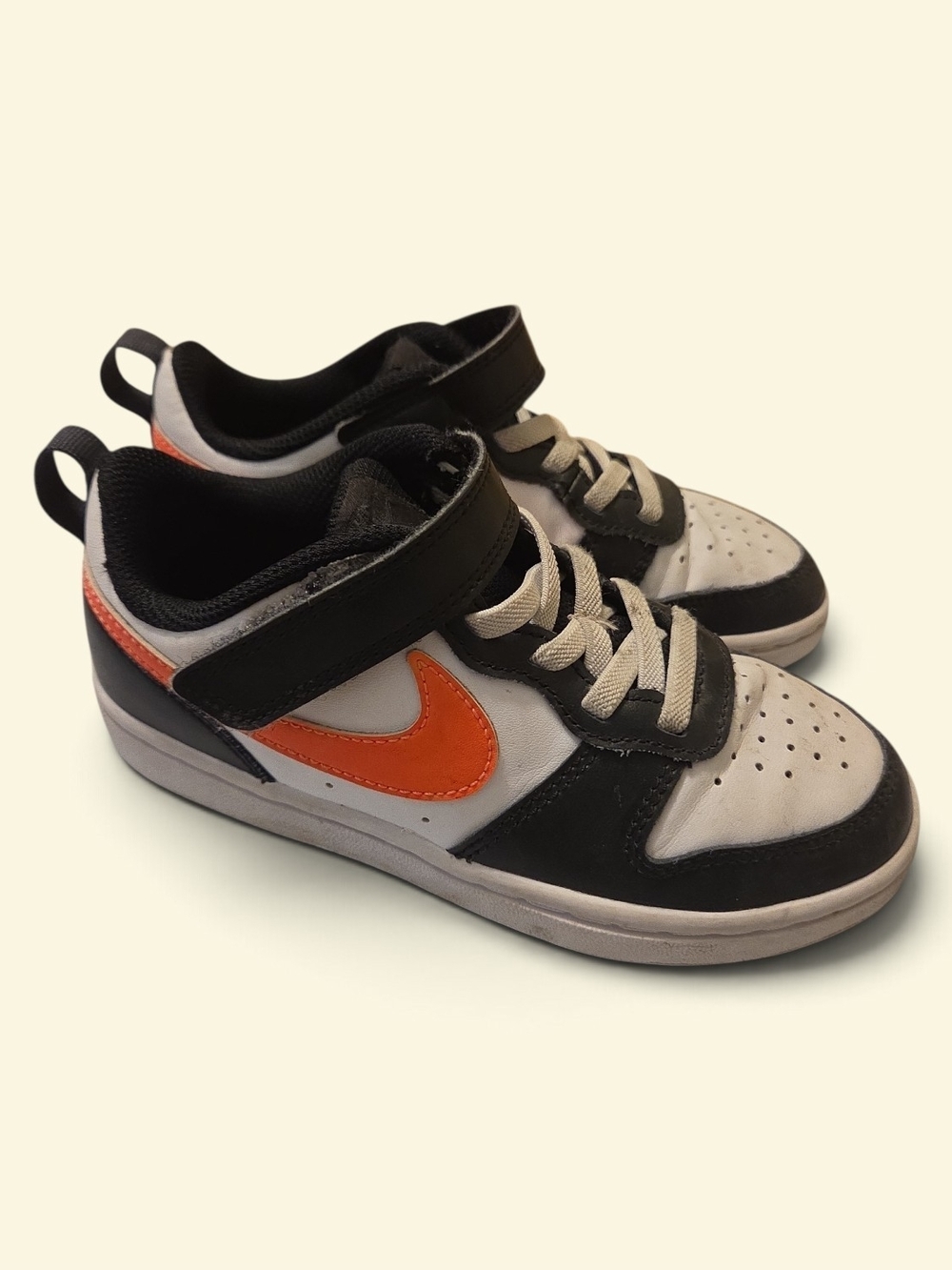 Nike Kids Low-Top Sneakers in White, Black & Orange Swoosh